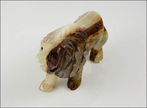 Фигурка из оникса лев 100х50х25 мм./Самоцветы мира/