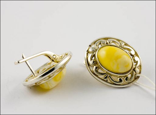 Серьги из мельхиора с янтарём 19385 купить в магазине Самоцветы мира