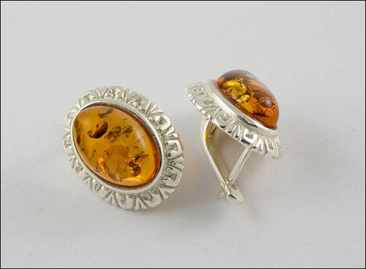 Серьги из мельхиора с янтарём 22783 купить в магазине Самоцветы мира