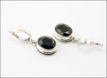 Серьги из серебра с гранатом овал 8х12 мм 28641