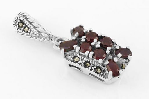 Серебряный кулон с гранатом 33514 купить в магазине Самоцветы мира