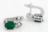 Серьги из серебра с изумрудом и фианитами овал 6х8 мм 50922