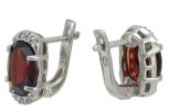 Серьги из серебра с гранатом и фианитами овал 8х10 мм 54180