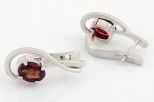 Серьги из серебра с гранатом овал 5х7 мм 54461