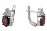 Серьги из серебра с гранатом и фианитами овал 6х8 мм 56809