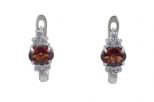 Серьги из серебра с гранатом и фианитами овал 5х7 мм 56811