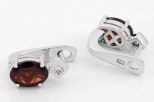 Серьги из серебра с гранатом и фианитами овал 6х8 мм 58544