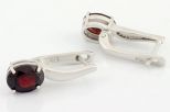 Серьги из серебра с гранатом овал 7х9 мм 59345