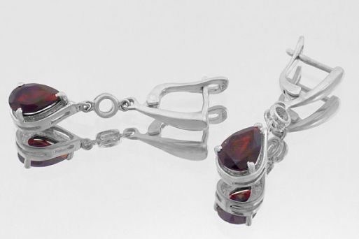 Серебряные серьги с гранатом 59719 купить в магазине Самоцветы мира