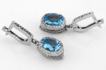 Серьги из серебра с топазом и фианитами овал 7х9 мм 60315