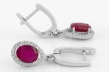Серьги из серебра с рубином и фианитами овал 6х8 мм 61702