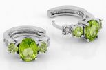 Серьги из серебра с хризолитом и фианитами овал 6х8 мм 2 круга 4 мм 61737
