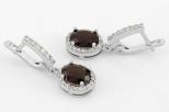 Серьги из серебра с раухтопазом и фианитами овал 7х9 мм 62141