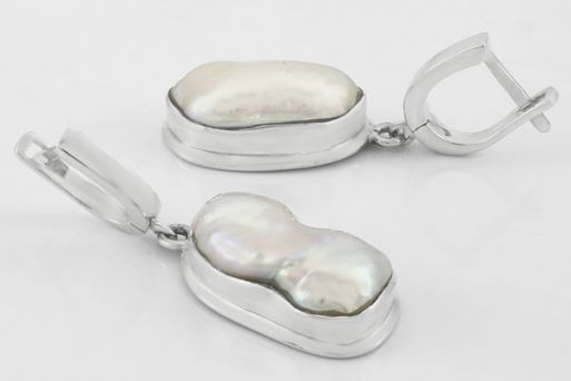 Серебряные серьги с жемчугом 63704 купить в магазине Самоцветы мира