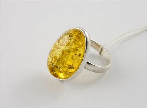 Кольцо из мельхиора с янтарём 9704 купить в магазине Самоцветы мира